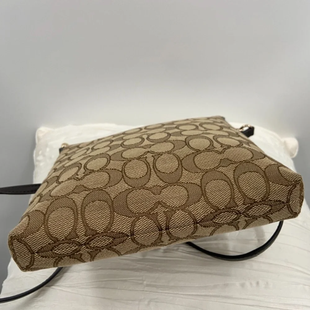 NEW Coach Bag Signature Canvas North South Swing pack 52576‎